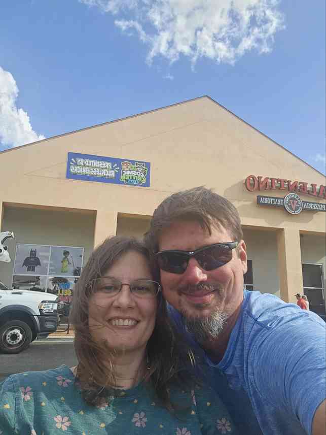 Jen and Jon Martin, owners of Cosmic Critter Toys, outside the shop on Clark Road